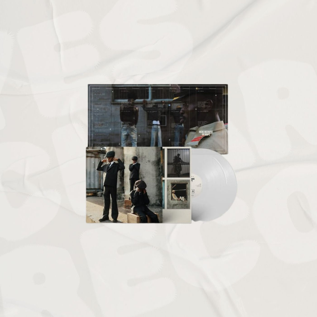 Ezra Collective - Here Because Of Hope (Indie Exclusive Translucent White 2LP) Vinyl Record